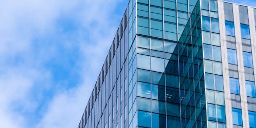 Beautiful architecture skyscraper office business building with glass window shape